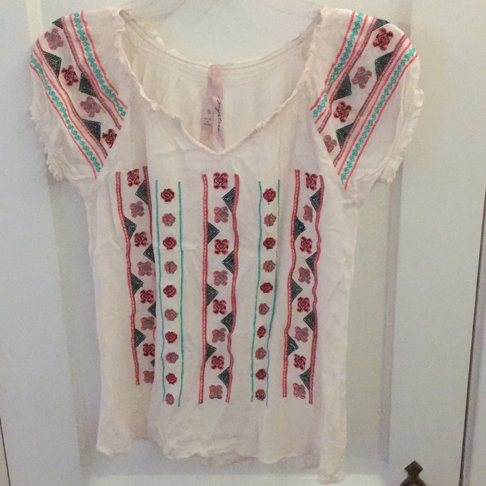 Embroidered top.